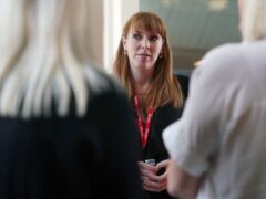 Labour Party deputy leader Angela Rayner talking to members of staff during a visit to London Stansted airport, in Essex, while on the General Election campaign trail. Picture date: Wednesday May 29, 2024.