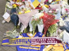 Tributes have been left by fans and friends of Rob Burrow outside Headingley Stadium in Leeds (Danny Lawson/PA)