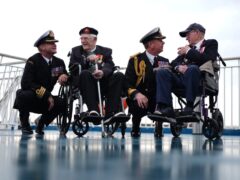 (l to r) Royal Navy Commander Glen Hickson, D-Day veteran Jim Grant, Royal Navy Commodore John Voyce, and D-Day veteran Charles Horne on board the Brittany Ferries ship Mont St Michel (Jordan Pettitt/PA)