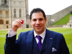 Mr Cohen was made an MBE at Windsor Castle (Ben Birchall/PA)