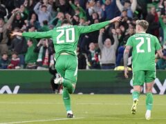 Republic of Ireland striker Troy Parrott celebrates his late winner against Hungary (Niall Carson/PA)