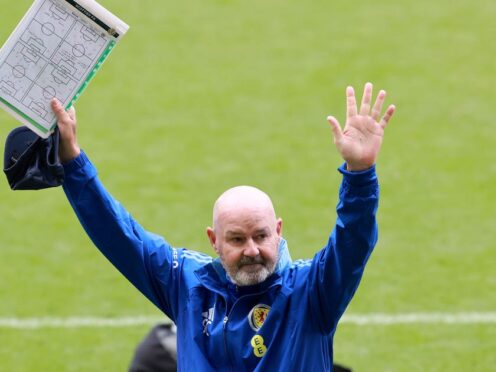 Steve Clarke greets a young crowd at Hampden (PA)