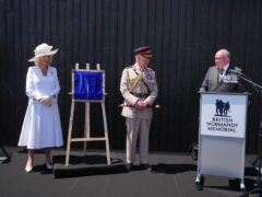 The King and Queen listen to General Lord Dannatt (Gareth Fuller/PA)