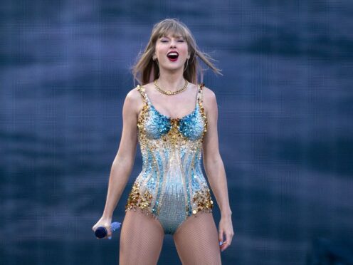 Taylor Swift performs on stage during her Eras Tour (Jane Barlow/PA)