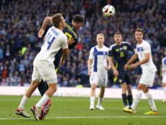 Scotland’s Lawrence Shankland, second left, scores their second goal against Finland (Owen Humphreys/PA)