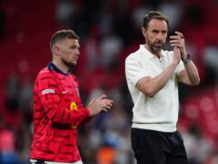 England manager Gareth Southgate and Kieran Trippier applaud the fans after the international friendly loss to Iceland at Wembley Stadium (Mike Egerton/PA)