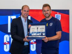 The Prince of Wales makes a presentation to Harry Kane (Paul Cooper/Daily Telegraph/PA)