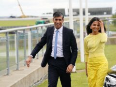 Prime Minister Rishi Sunak and wife Akshata Murty arrive for the launch of the Conservative Party General Election manifesto at Silverstone (James Manning/PA)