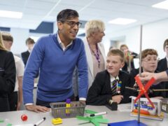 Rishi Sunak speaking to pupils during a science lesson at John Whitgift Academy, Grimsby (Dominic Lipinski/PA)