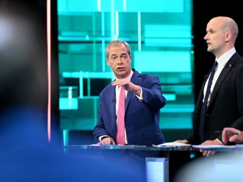 Reform UK leader Nigel Farage and Stephen Flynn of the SNP taking part in the ITV debate (Jonathan Hordle/ITV/PA)
