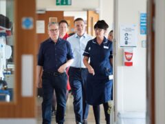 Under current NHS guidance, transgender patients are entitled to be accommodated in single-sex wards that match how they identify (Stefan Rousseau/PA)
