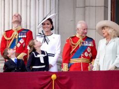 The Prince and Princess of Wales with their children, Prince George, Prince Louis and Princess Charlotte and the King and Queen on the balcony of Buckingham Palace (Gareth Fuller/PA)