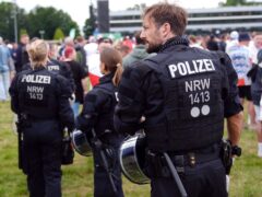 Police presence in a fan park near the ground ahead of England’s game against Serbia in Gelsenkirchen (Bradley Collyer/PA).
