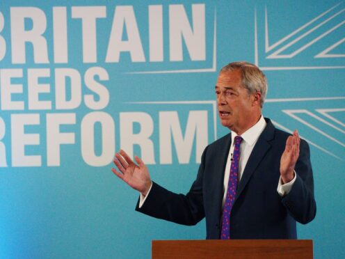 The Reform UK leader was in Merthyr Tydfil to launch his party’s election document (Ben Birchall/PA)