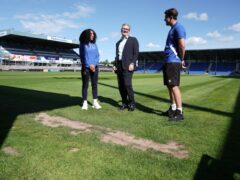 Labour Party leader Sir Keir Starmer (centre) with players Layah Douglas and Charlie White during a visit to Bristol Rovers FC while on the General Election campaign trail (Stefan Rousseau/PA)
