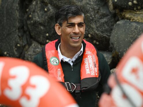 Prime Minister Rishi Sunak during a campaign visit to Clovelly in North Devon (Leon Neal/PA)