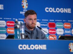 Can Scotland captain Andy Robertson and his team produce a response in their second match of Euro 2024 in Cologne on Wednesday night? (UEFA Handout/PA)