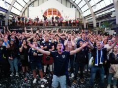 Scotland fans celebrated as the national team earned a hard-fought 1-1 draw against Switzerland (Jane Barlow/PA).