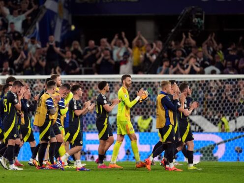 Scotland players applaud their supporters after a hard-fought point (Martin Rickett/PA)
