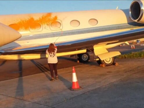 Just Stop Oil protesters spraying orange paint on parked private jets at Stansted (Just Stop Oil/PA)