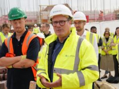 Labour leader Sir Keir Starmer (centre) during a visit to Persimmon Homes Germany Beck in York (Stefan Rousseau/PA)