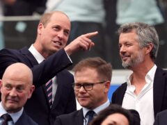 The Prince of Wales and King Frederik X of Denmark in the stands during the Uefa Euro 2024 match at the Frankfurt Arena in Frankfurt, Germany (Martin Rickett/PA)