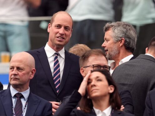 The Prince of Wales and King Frederik X of Denmark in the stands during the UEFA Euro 2024 match (Martin Rickett/PA)