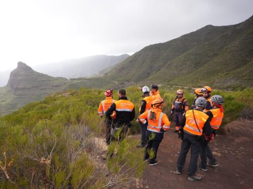 A group of search and rescue workers near to the village of Masca, Tenerife, where the search for missing British teenager Jay Slater, 19, from Oswaldtwistle, Lancashire, continues (James Manning/PA)