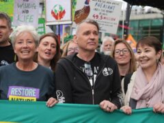 Dame Emma Thompson, Dale Vince and Caroline Lucas took part in a Restore Nature Now protest in central London (Jeff Moore/PA)