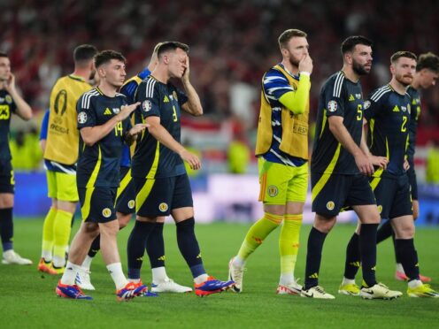 Scotland’s players react to their Euro 2024 exit (Andrew Milligan/PA)