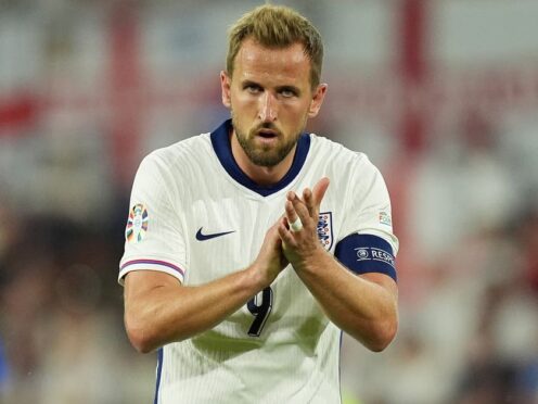 Harry Kane is confident England will step it up in the knockout stages (Martin Rickett/PA)