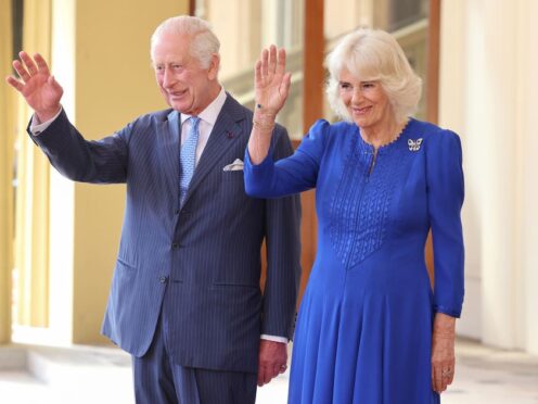 King Charles III and Queen Camilla wave and smile as they formally bid farewell to Emperor Naruhito and his wife Empress Masako of Japan as they leave Buckingham Palace, on the final day of their state visit to the UK (Chris Jackson/PA)