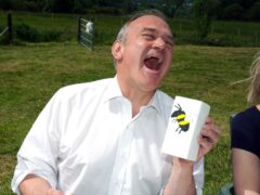 Liberal Democrat leader Sir Ed Davey painting pottery during a visit to Vale House, Marple Bridge in Greater Manchester (Peter Byrne/PA)