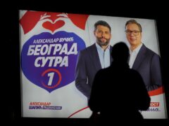 Voters in Serbia are casting ballots in a re-run election in the capital, Belgrade, and dozens of other cities and towns (Darko Vojinovic/AP)