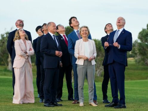 Leaders of the G7 are turning their attention to migration on the second day of their summit on Friday (Domenico Stinellis/AP)