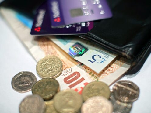 The Chancellor is facing calls to bring forward plans to cut the basic rate of income tax (PA)