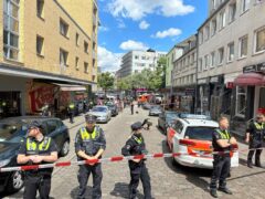 Officers cordoned off an area near the Reeperbahn in Hamburg following the incident (Steven Hutchings/dpa via AP)