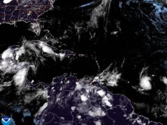 A satellite image showing tropical storm Beryl as it strengthens over the Atlantic (NOAA via AP)