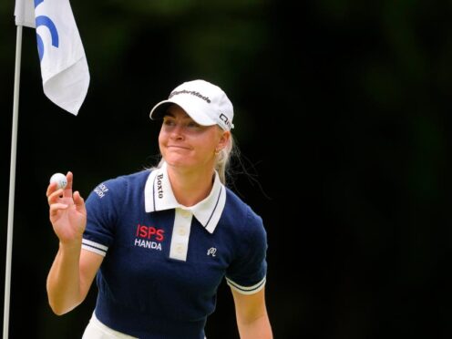 Charley Hull, of England, holds her ball after the 16th hole (Lindsey Wasson/AP)