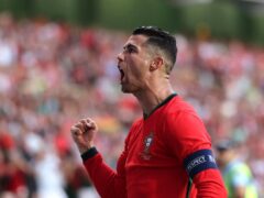 Portugal skipper Cristiano Ronaldo celebrates after scoring against the Republic of Ireland in Aveiro (Luis Vieira/AP)