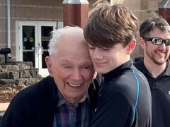 Orville Allen, pictured hugging his great-grandson, is said to be the oldest American ever to donate an organ upon death (Linda Mitchelle via AP)