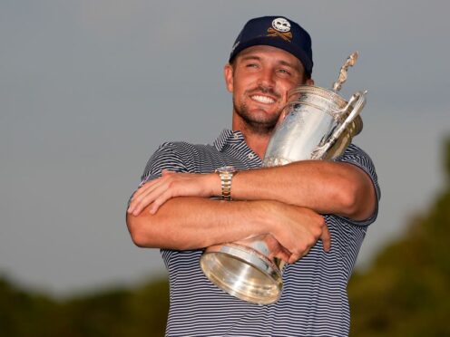 Bryson DeChambeau holds the trophy after winning the US Open at Pinehurst (George Walker IV/AP)