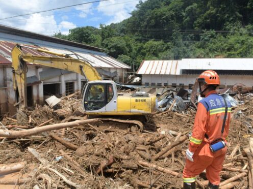 Several people have died and others are missing after downpours caused historic flooding in rural parts of Guangdong province in southern China (Xinhua via AP)