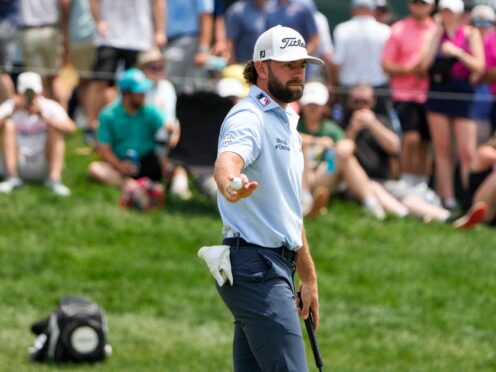 Cameron Young reacts after making a putt on the 17th green during the third round of the Travelers Championship golf tournament at TPC River Highlands, Saturday, June 22, 2024, in Cromwell, Conn. (AP Photo/Seth Wenig)