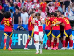 Croatia midfielder Luka Modric saw his side suffer an opening defeat as Spain coasted to victory in Berlin (Ebrahim Noroozi/AP)