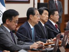 South Korea’s Prime Minster Han Duck-soo, second left, speaks during a cabinet meeting at the government complex in Seoul (Choi Jae-gu/Yonhap/AP)
