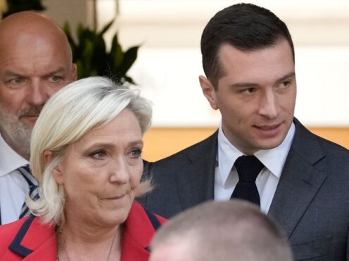 France’s National Rally party president Jordan Bardella with Marine Le Pen (Christophe Ena/AP)