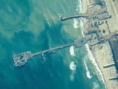 Image provided by US Central Command showing the Trident Pier being placed on the coast of the Gaza Strip before it was damaged (US Central Command/AP)