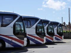 A fleet of luxury coaches should be funded by the next government to boost tourism and reduce car use across the UK, according to a new report (Alamy/PA)