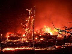 A home burns in California (Kent Porter/The Press Democrat/AP)